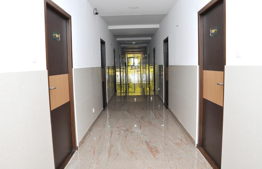 Hotel The Home Tiruppur Rum bild